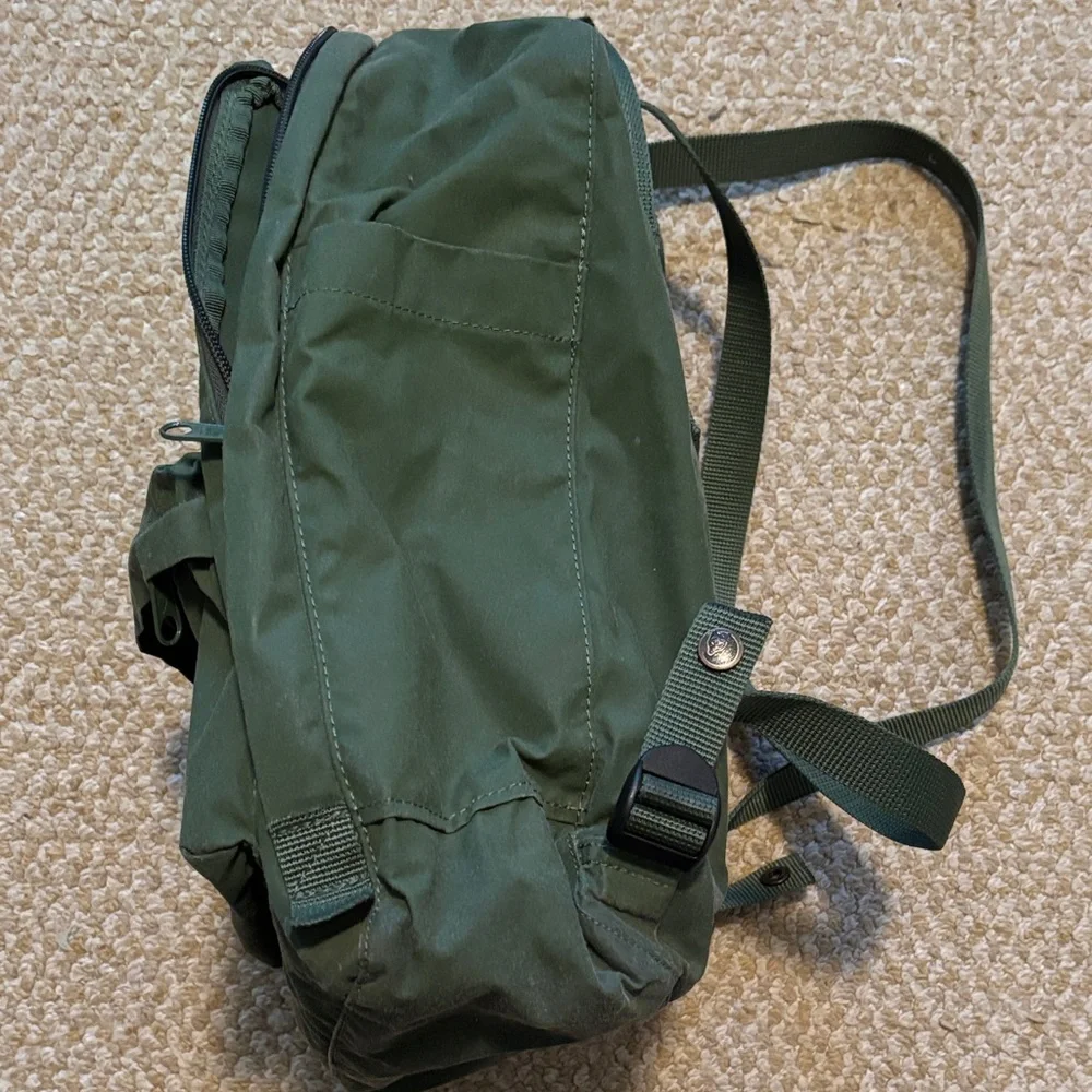 Fjallraven Kanken Olive Green Backpack with Round Logo